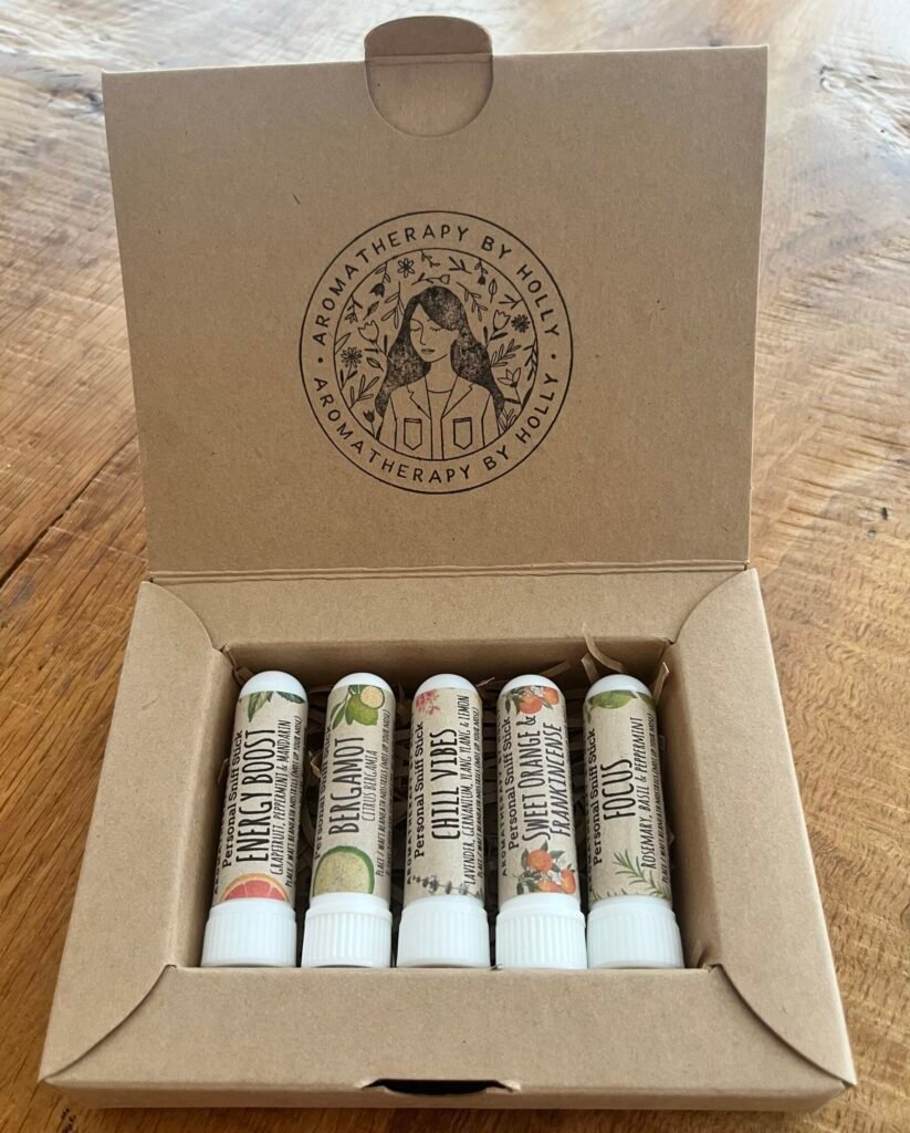 Aromatherapy sniff stick gift set with five essential oil inhalers in a kraft gift box
